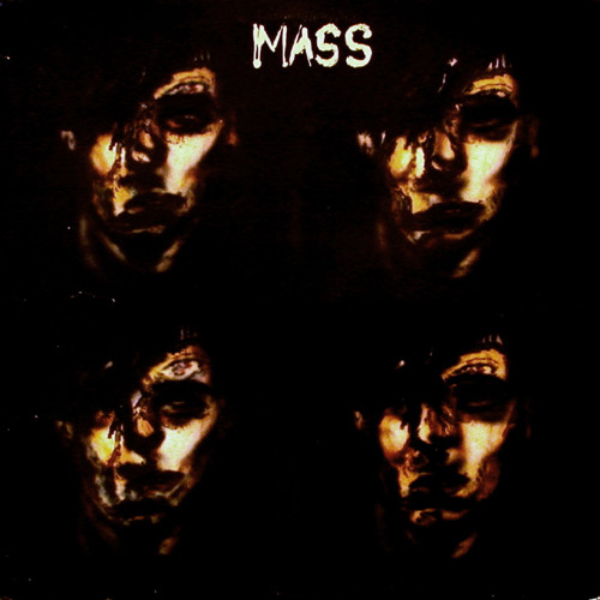 The first album by MASS. A black background with four melted faces in each quadrant.  Mass written in the middle on the top.